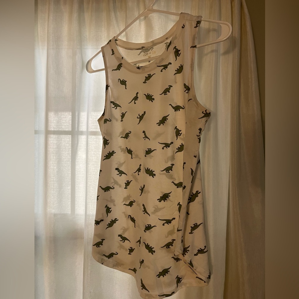 White and green dinosaur tank